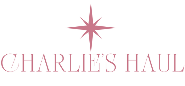 Logo of 'Charlie's Haul' with a pink star on a white background